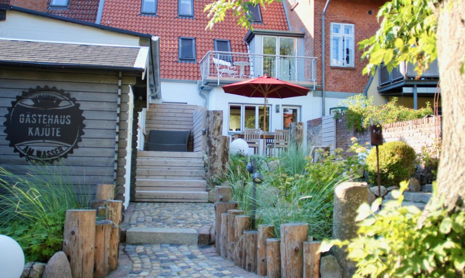 Gaestehaus Kajuete Direkt Am Wasser Friedrichstadt Dış mekan fotoğraf
